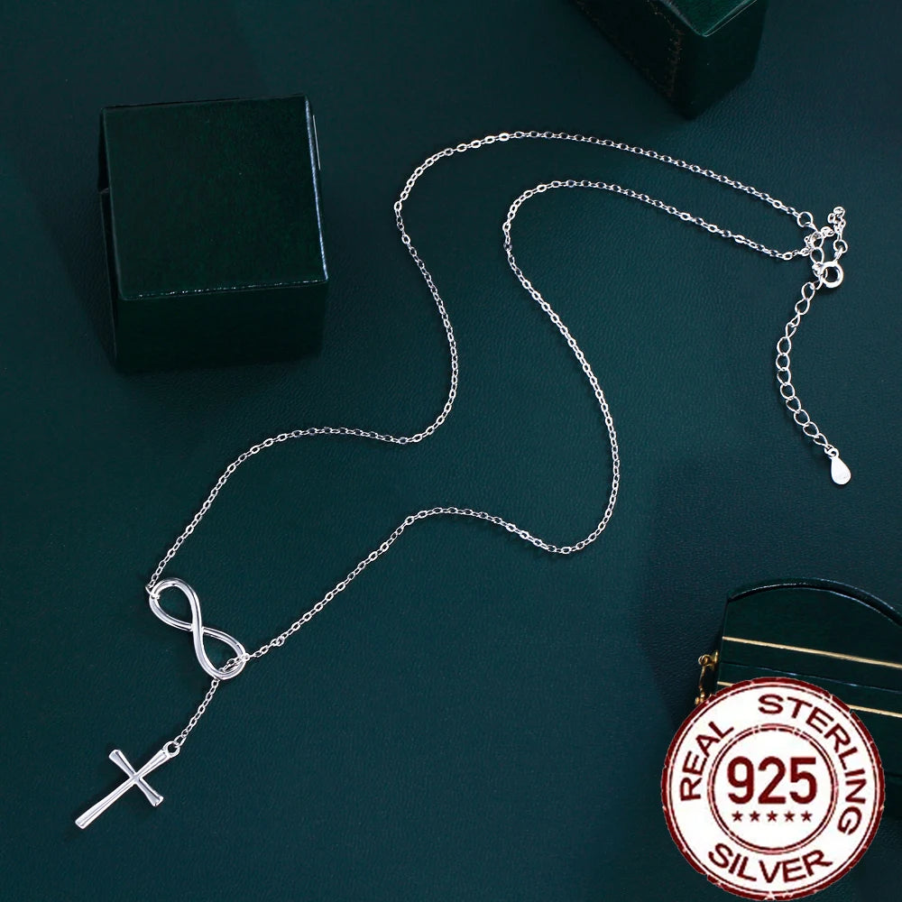 Elegant Silver Cross Infinity Necklace